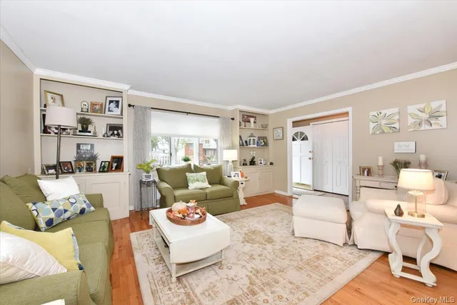 a living room with furniture and a rug