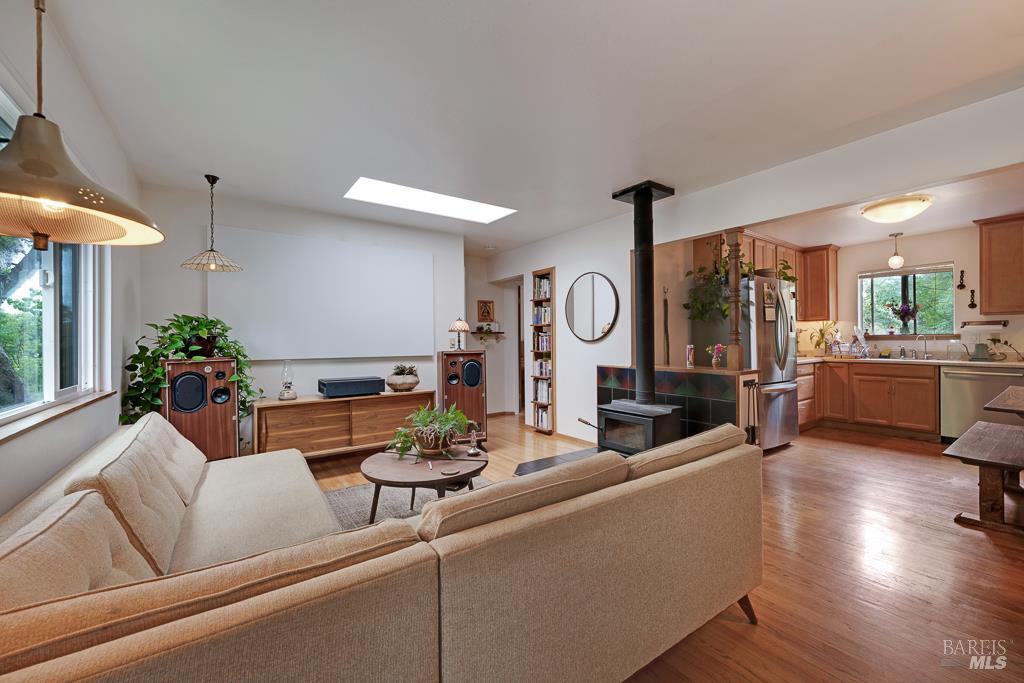 4542 Thomas Road Sebastopol, CA 95472 - Photo 50 of 60 a living room with furniture and a fireplace