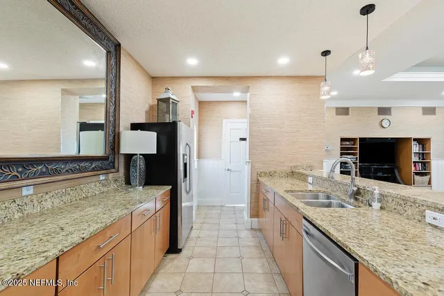 a view of a swimming pool with a lounge chairs