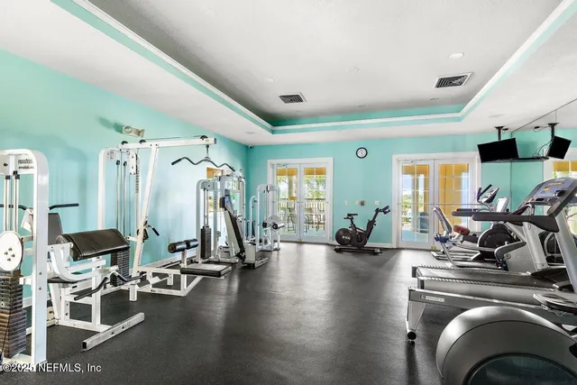 a view of a house with furniture and garden