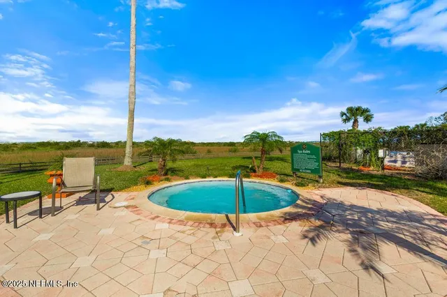 a view of a playground with a big yard