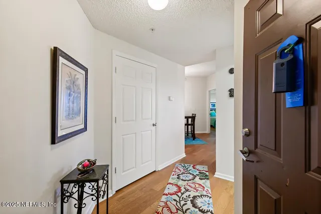 a view of a balcony with wooden floor