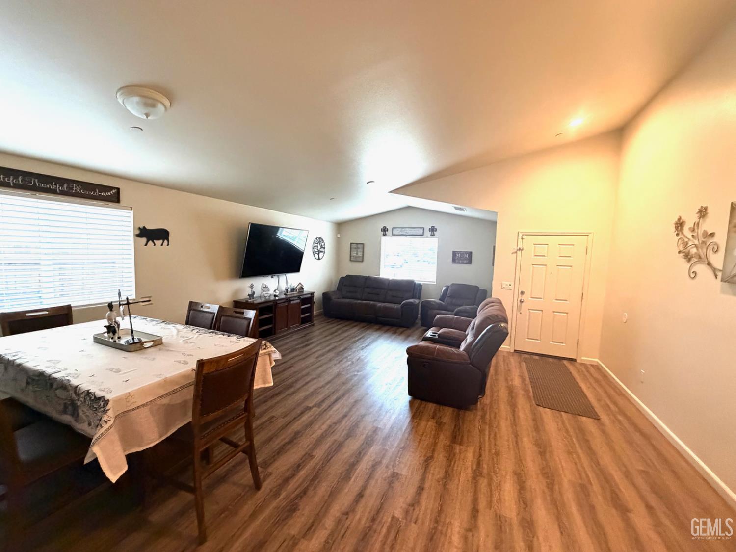 Undisclosed Address Merced, CA 95341 - Photo 3 of 14 a living room with furniture and wooden floor