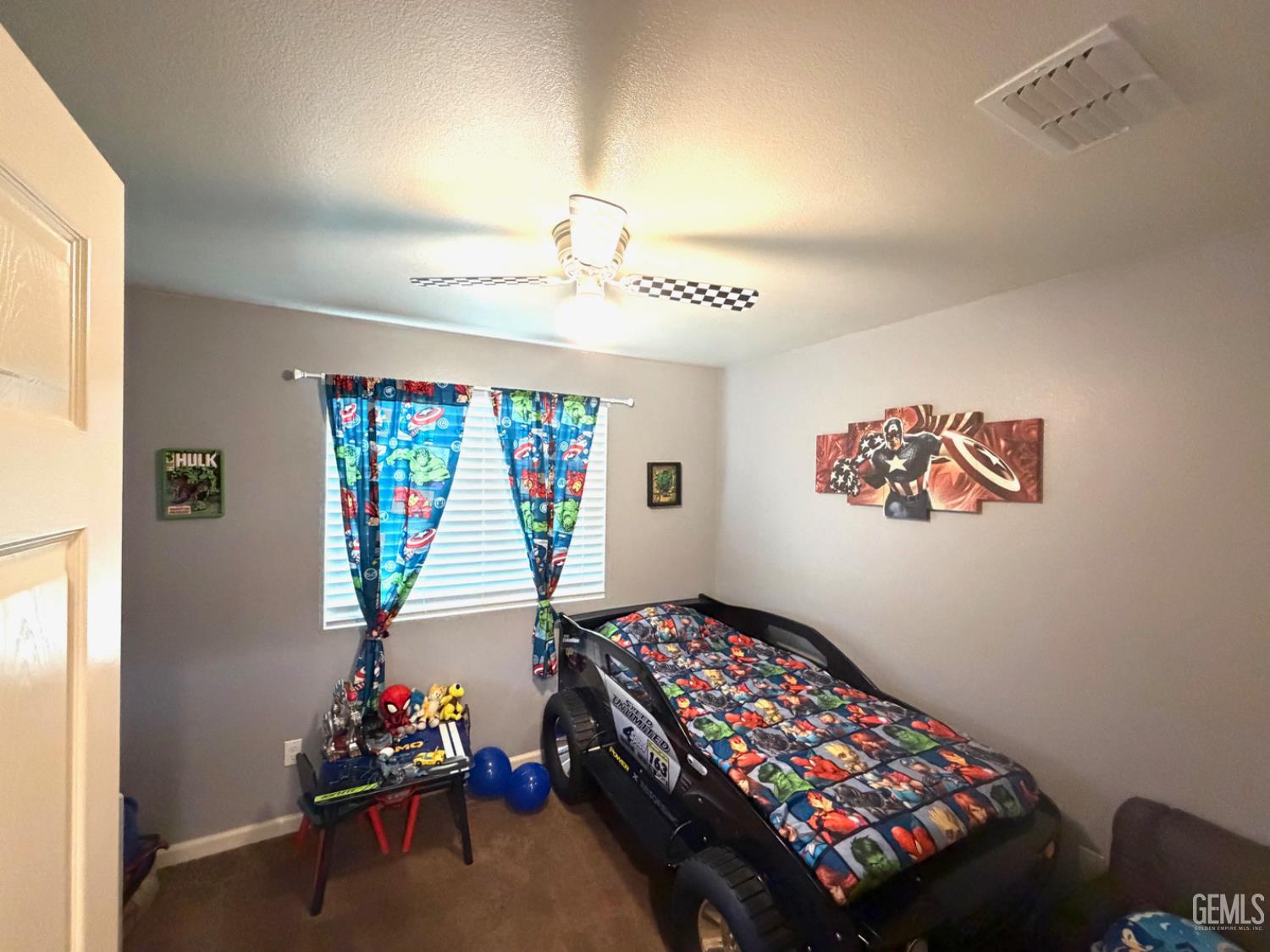 Undisclosed Address Merced, CA 95341 - Photo 8 of 14 a bedroom with furniture and a window