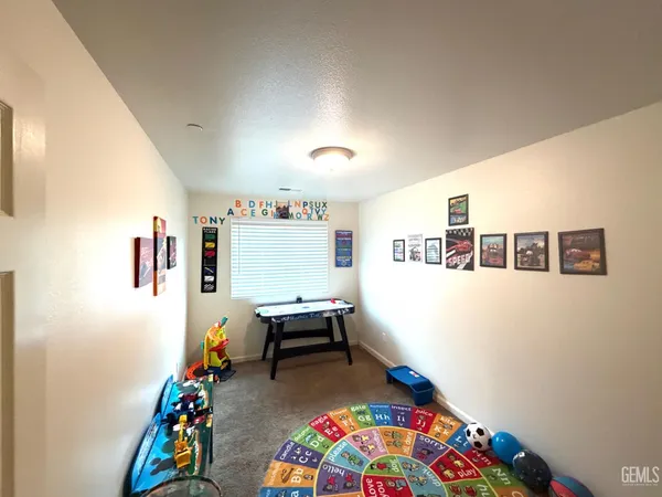 a bedroom with furniture and a table