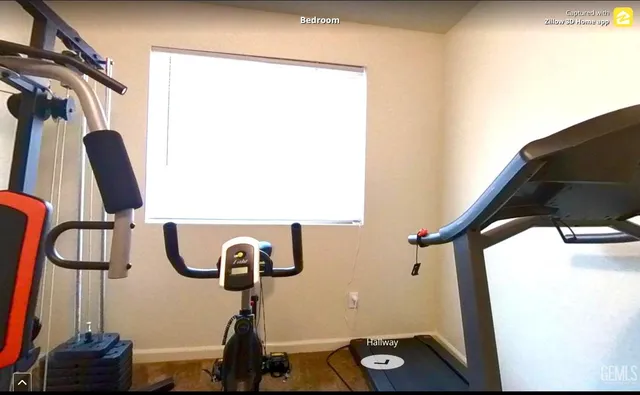 a view of staircase with a rug