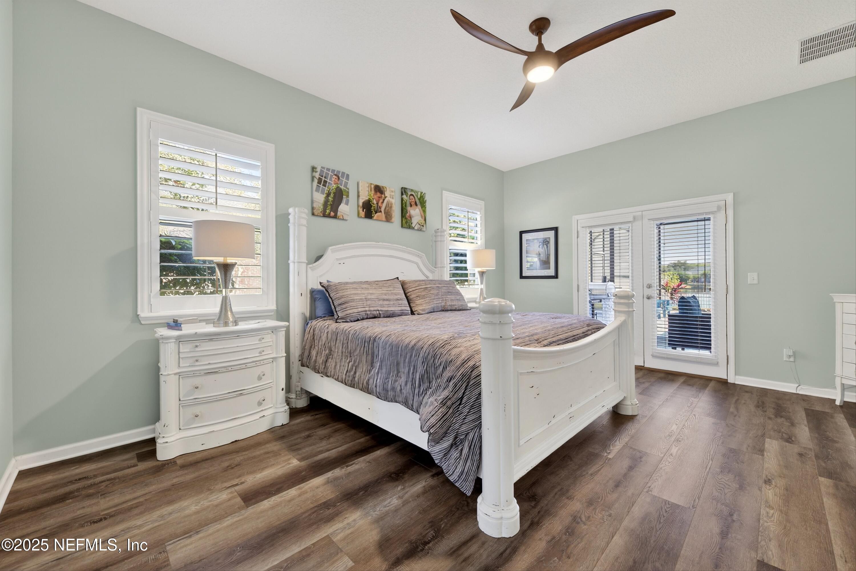 1104 Westfield Way St. Augustine, FL 32095 - Photo 12 of 53 a bedroom with a large bed and a window