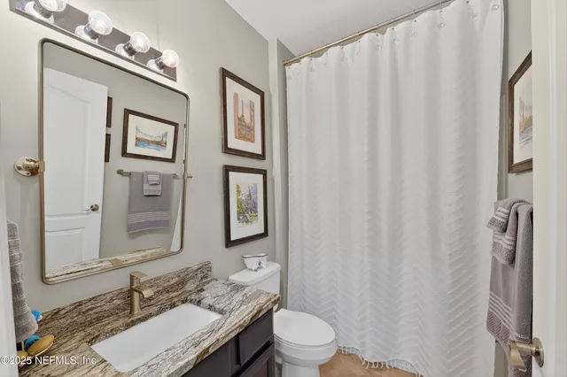 a swimming pool with outdoor seating and yard