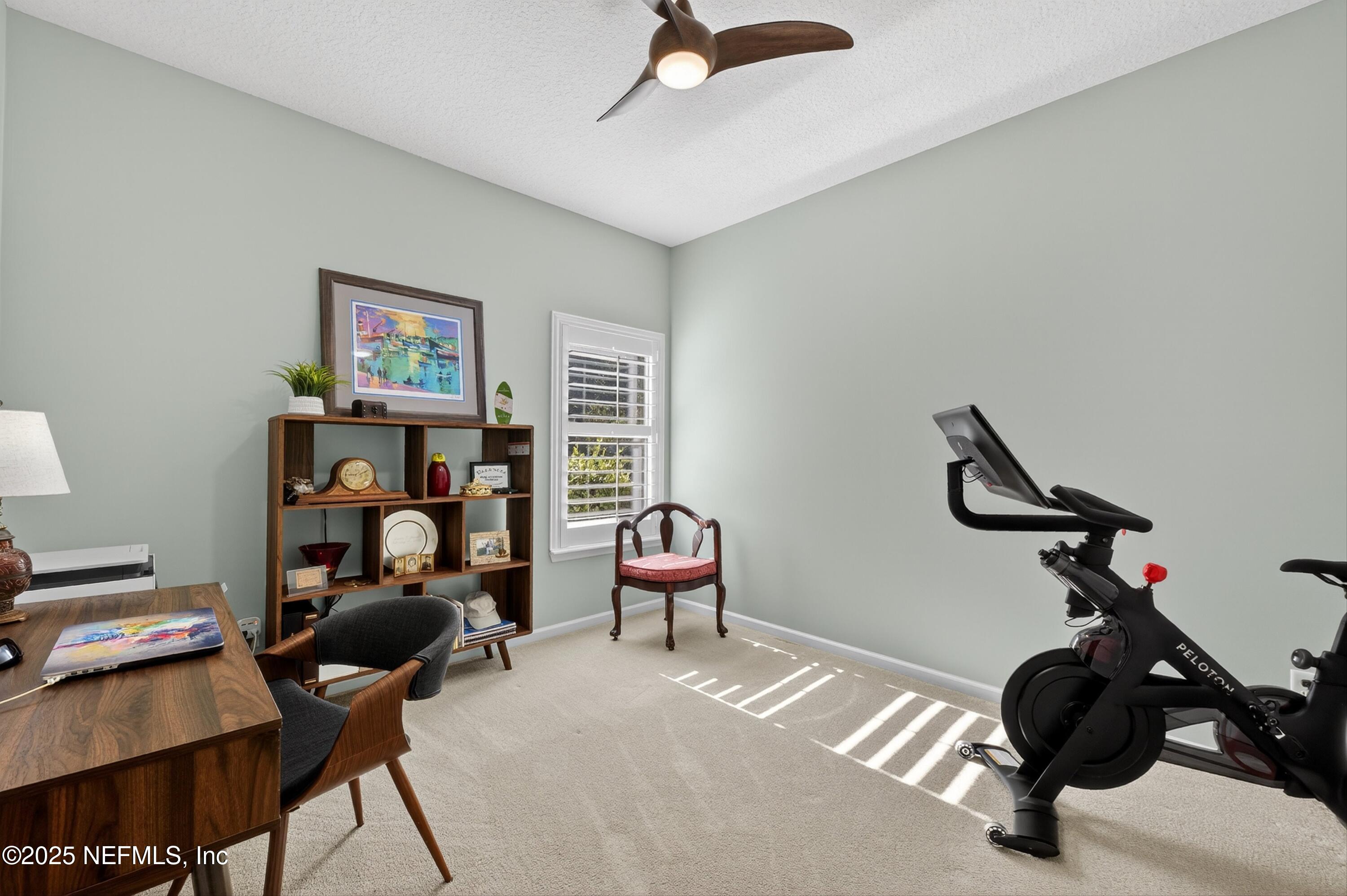 1104 Westfield Way St. Augustine, FL 32095 - Photo 36 of 53 a view of a workspace with furniture and a window