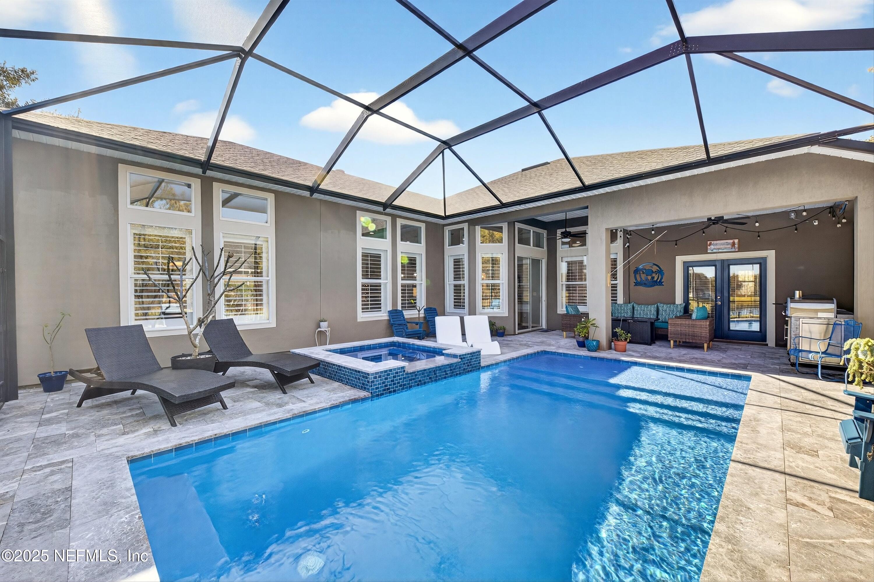 1104 Westfield Way St. Augustine, FL 32095 - Photo 40 of 53 a living room with furniture and a table