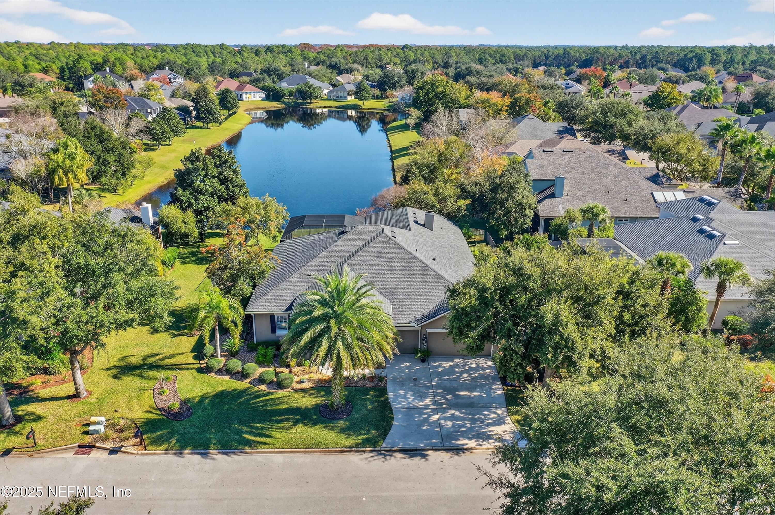 1104 Westfield Way St. Augustine, FL 32095 - Photo 45 of 53 an aerial view of a houses with a lake view