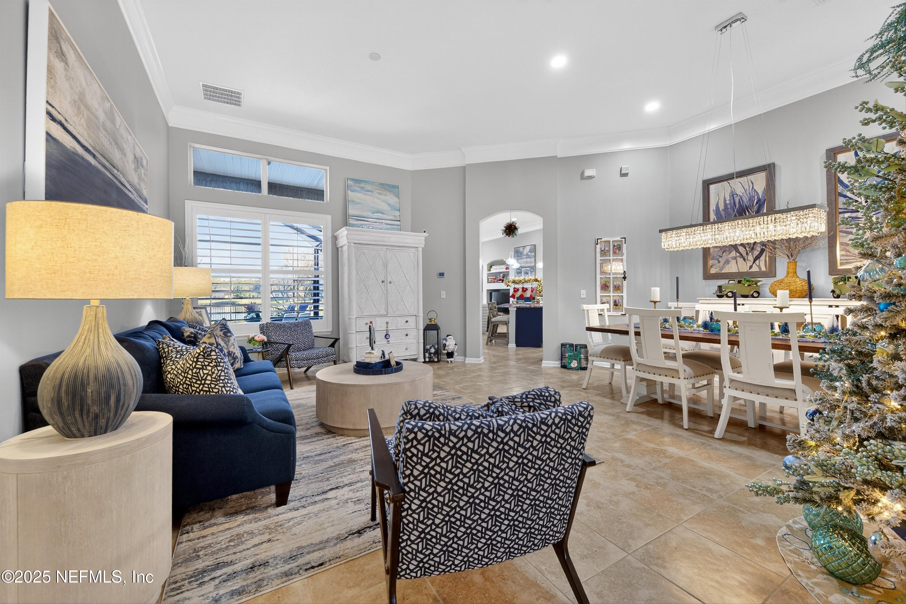 1104 Westfield Way St. Augustine, FL 32095 - Photo 9 of 53 a living room with furniture and a large window