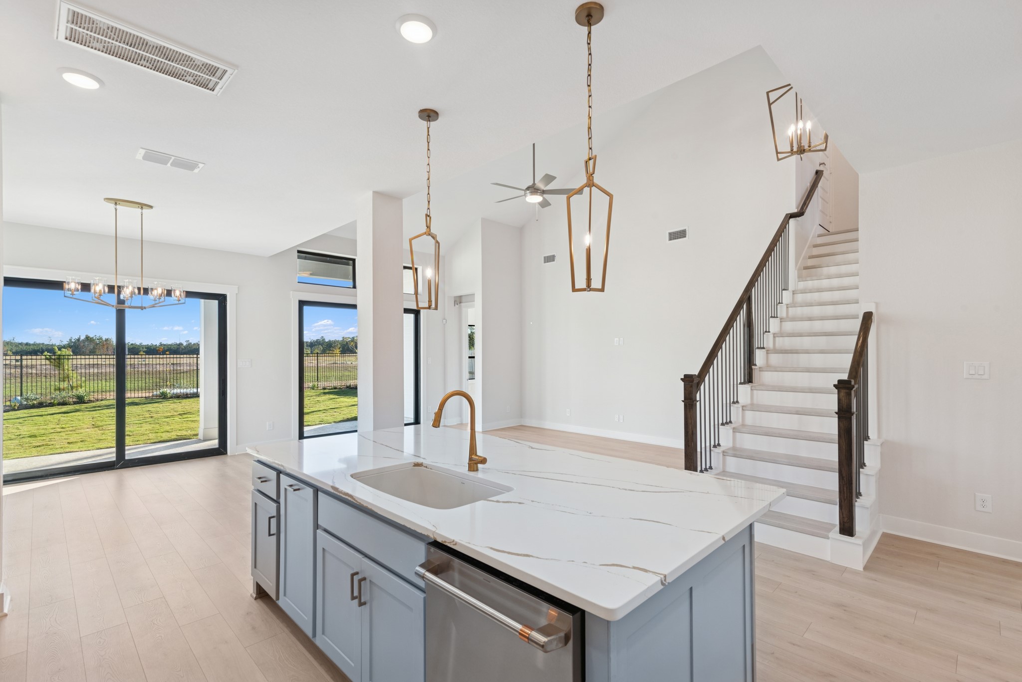 16146 Rita Road Conroe, TX 77302 - Photo 24 of 49 a kitchen with sink refrigerator and window