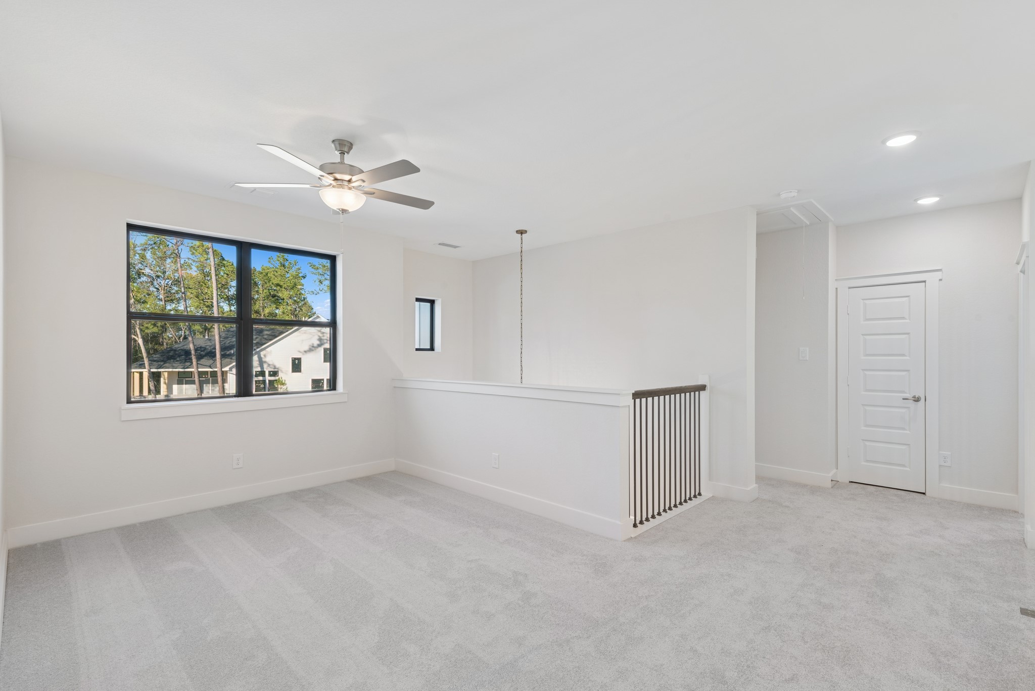 16146 Rita Road Conroe, TX 77302 - Photo 33 of 49 a view of an empty room with a window