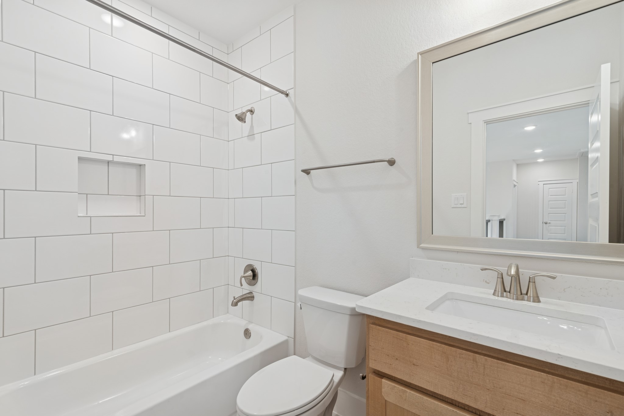 16146 Rita Road Conroe, TX 77302 - Photo 34 of 49 a bathroom with a sink vanity granite toilet tub and shower