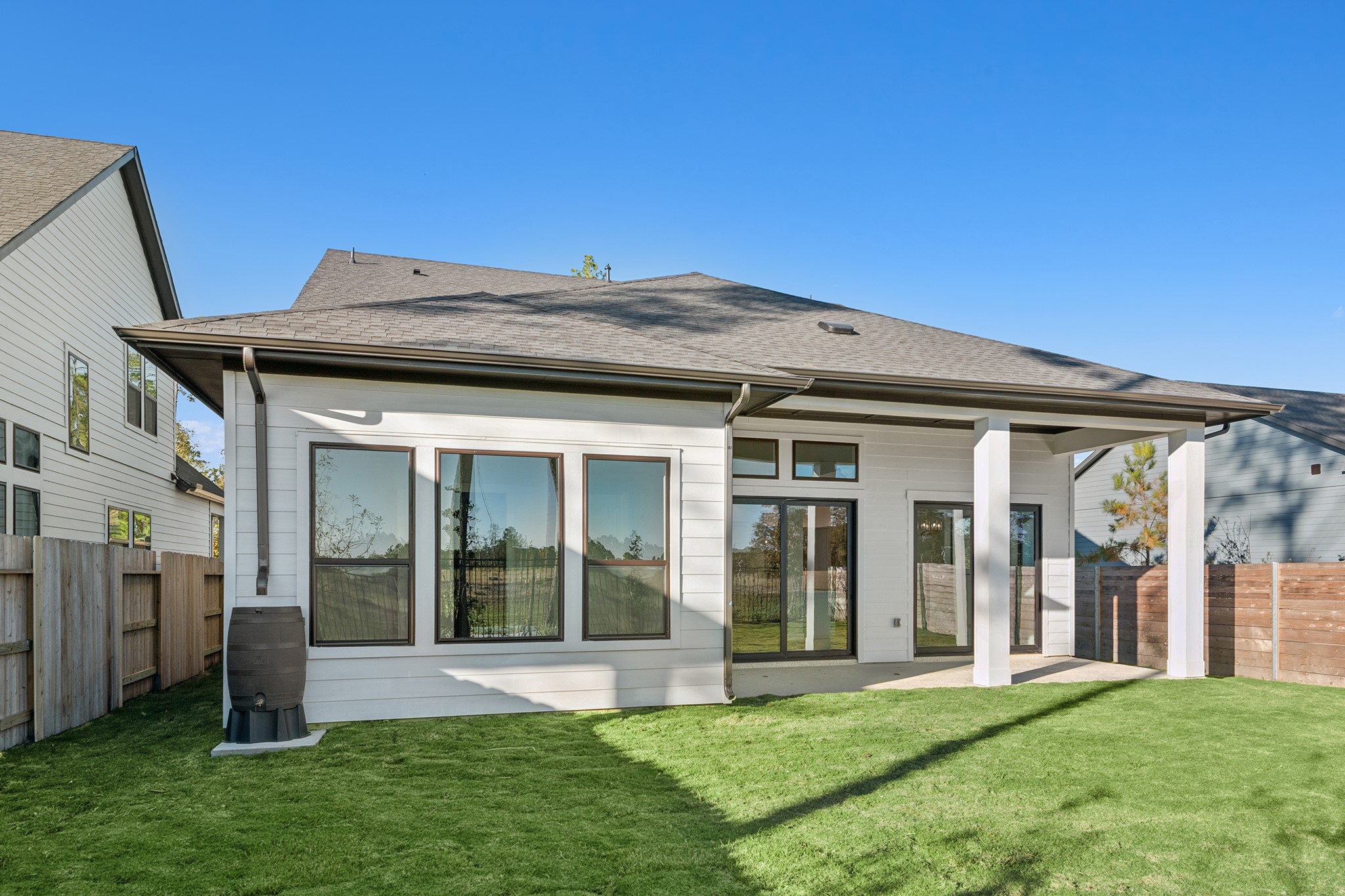 16146 Rita Road Conroe, TX 77302 - Photo 8 of 49 a view of a house with a garden and entryway