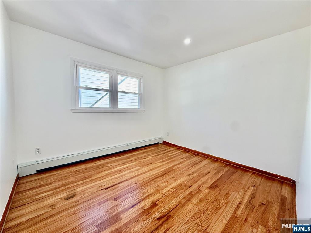 41 Corabelle Avenue, Unit 2 Lodi, NJ 07644 - Photo 20 of 21 wooden floor in a room