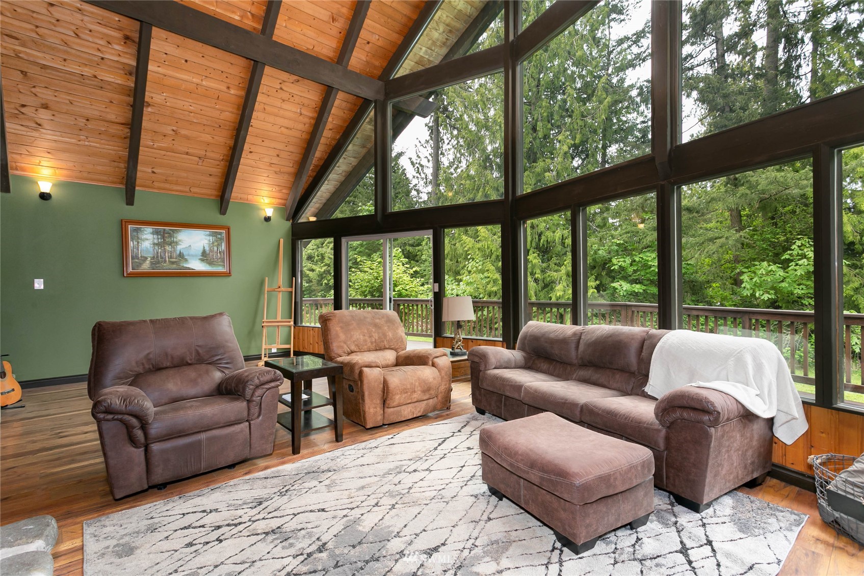 15722 240th Street East Graham, WA 98338 - Photo 11 of 40 a living room with furniture and a large window