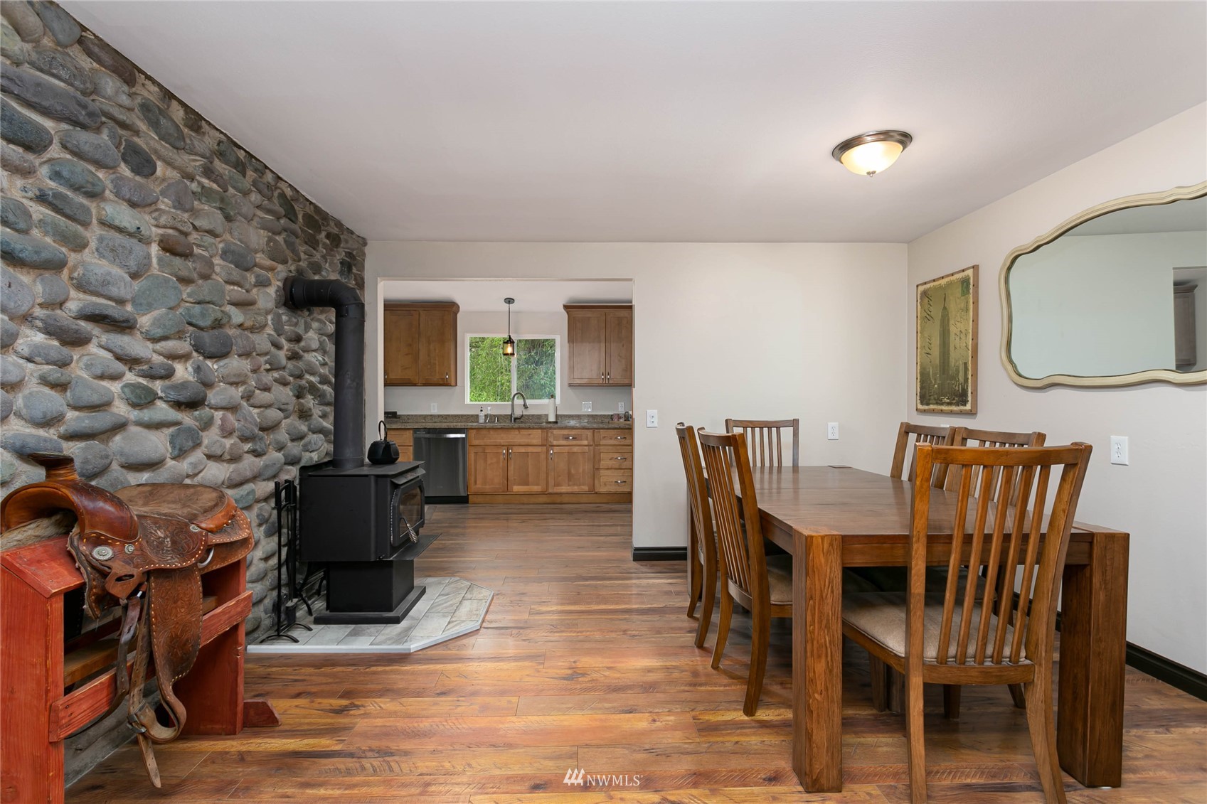 15722 240th Street East Graham, WA 98338 - Photo 12 of 40 a view of a dining room with furniture