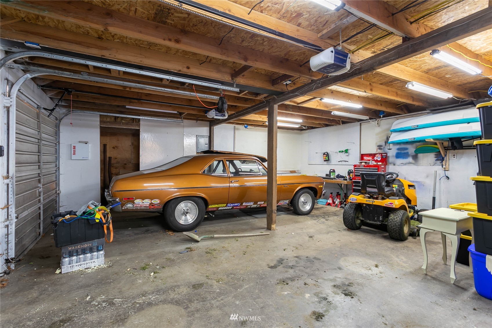 15722 240th Street East Graham, WA 98338 - Photo 26 of 40 a car parked in a garage