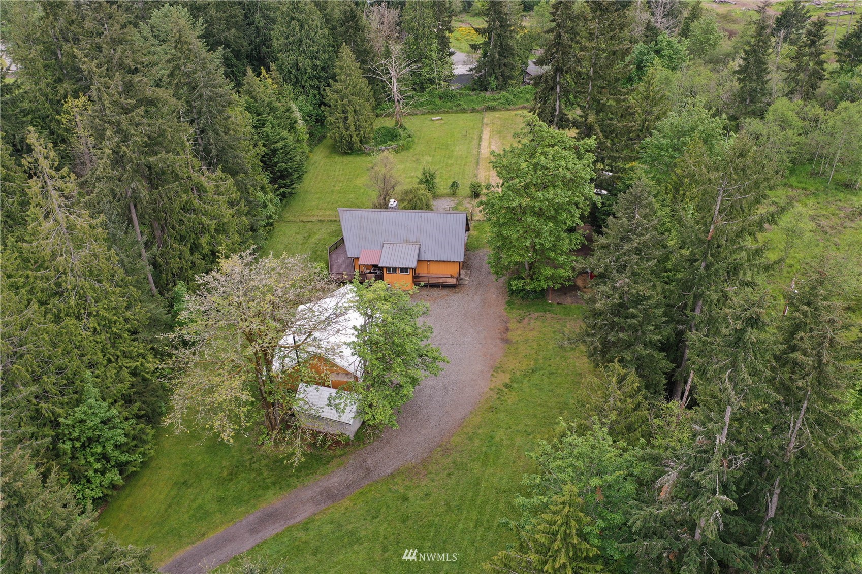 15722 240th Street East Graham, WA 98338 - Photo 32 of 40 an aerial view of a house with a yard