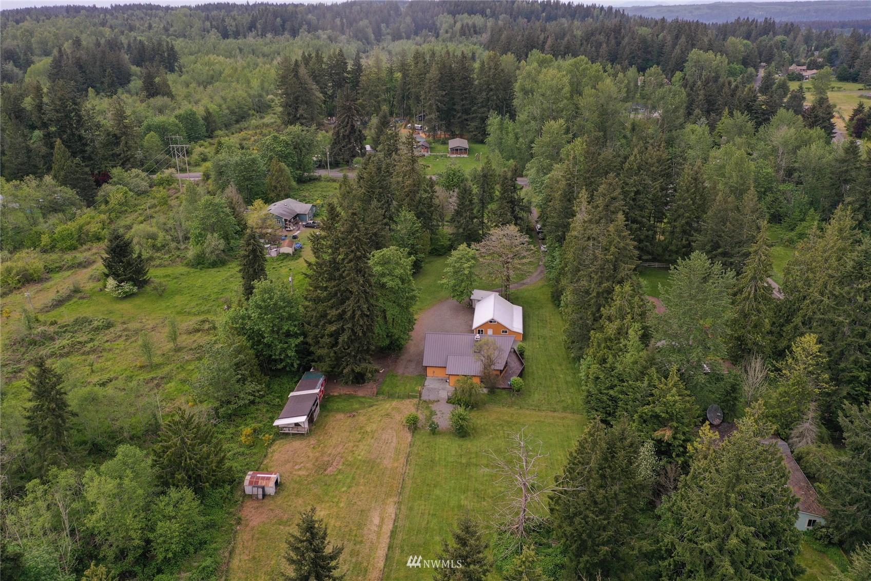 15722 240th Street East Graham, WA 98338 - Photo 35 of 40 an aerial view of a house with a yard