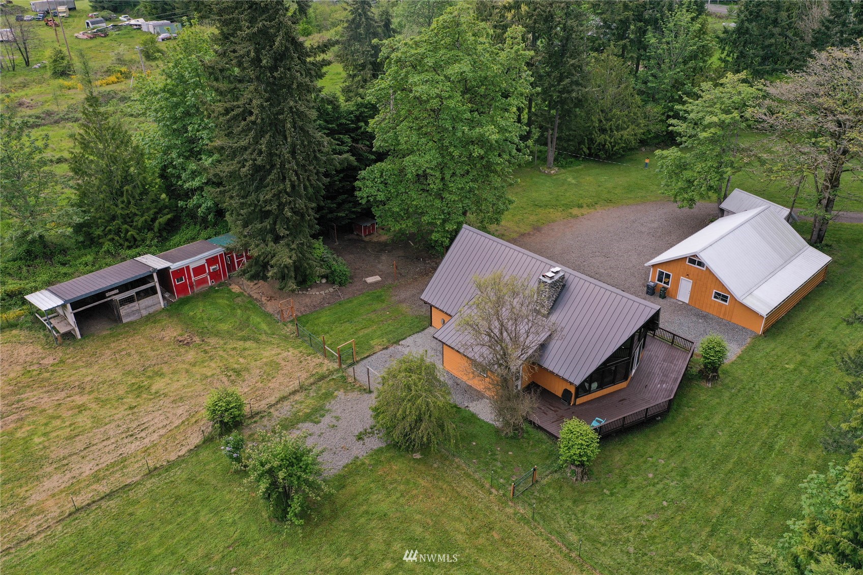 15722 240th Street East Graham, WA 98338 - Photo 38 of 40 an aerial view of a house with a yard