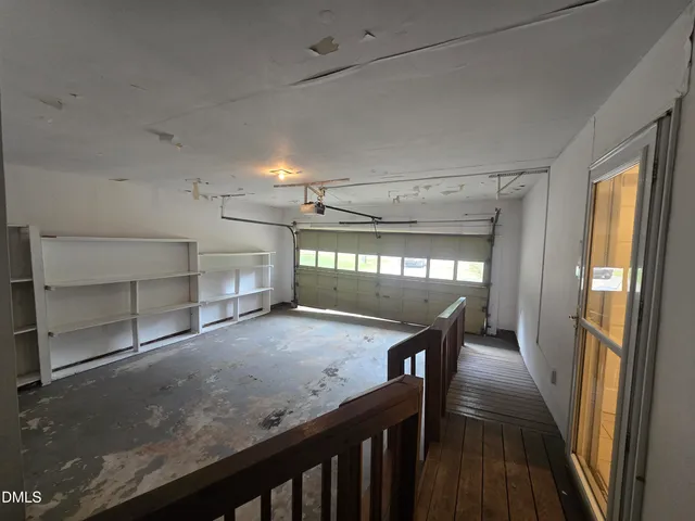 a view of a hallway with an outdoor space