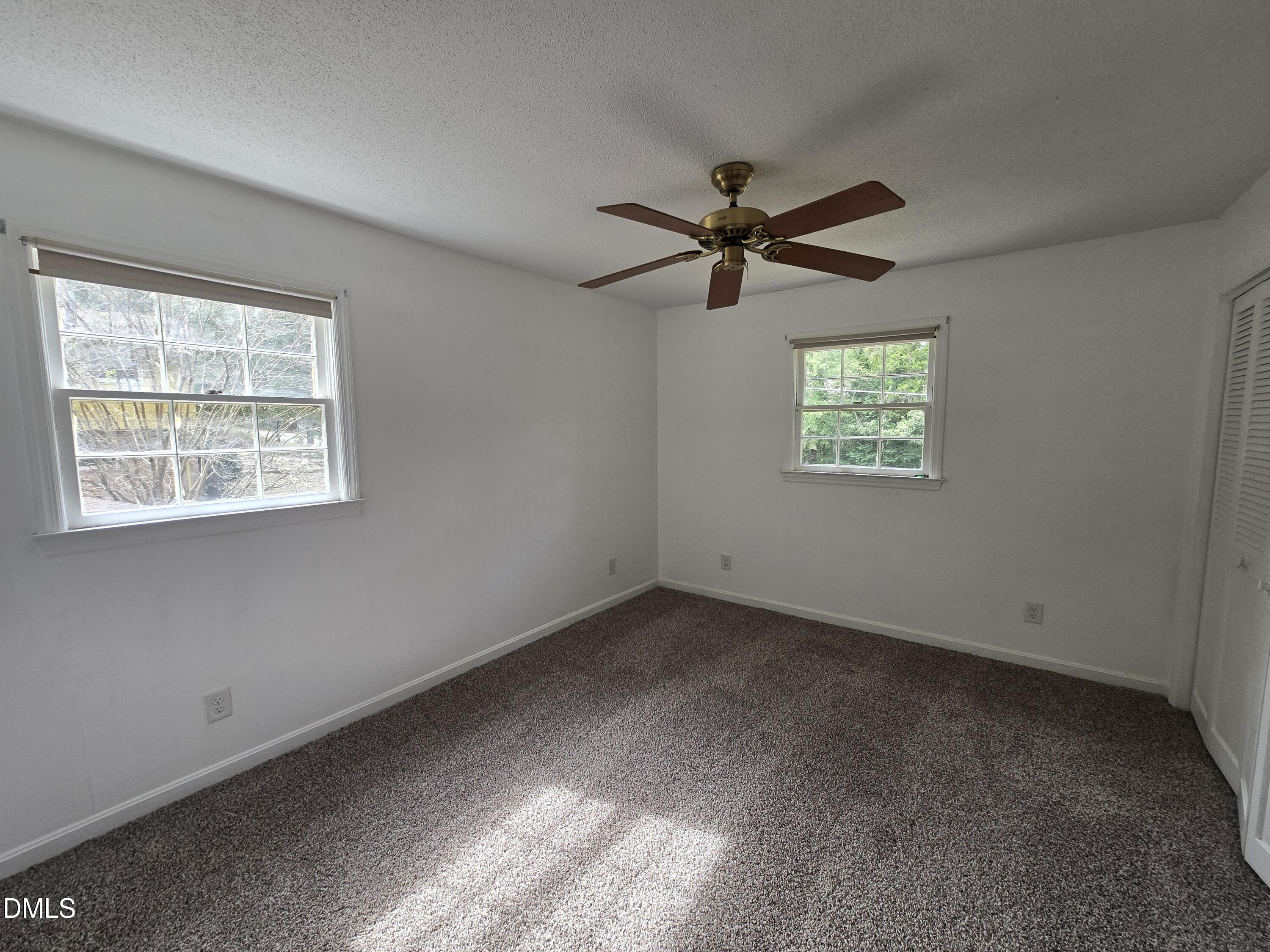 4311 Pope Road Durham, NC 27707 - Photo 16 of 23 a view of an empty room with a window