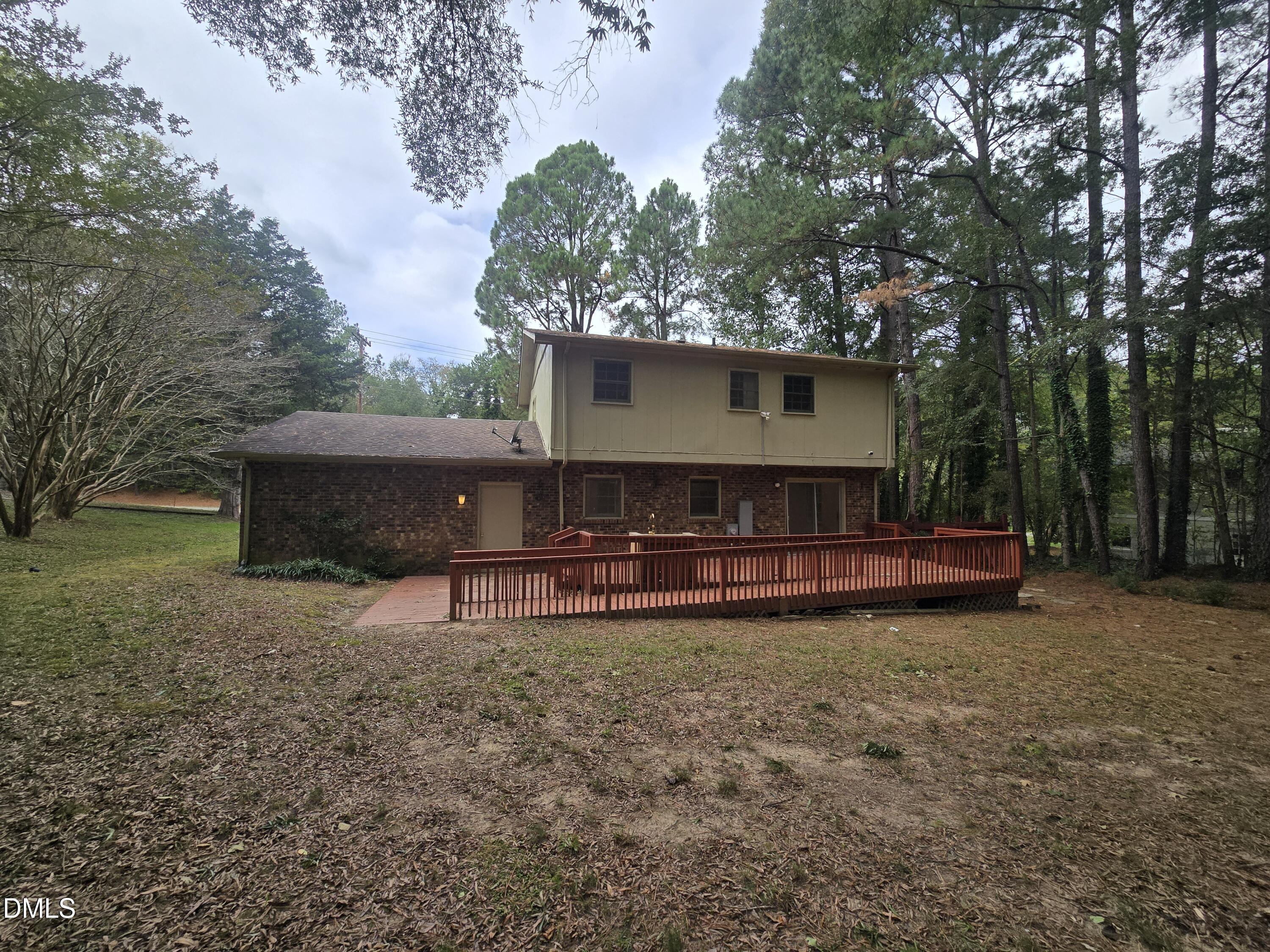 4311 Pope Road Durham, NC 27707 - Photo 8 of 23 a view of a house with a back yard