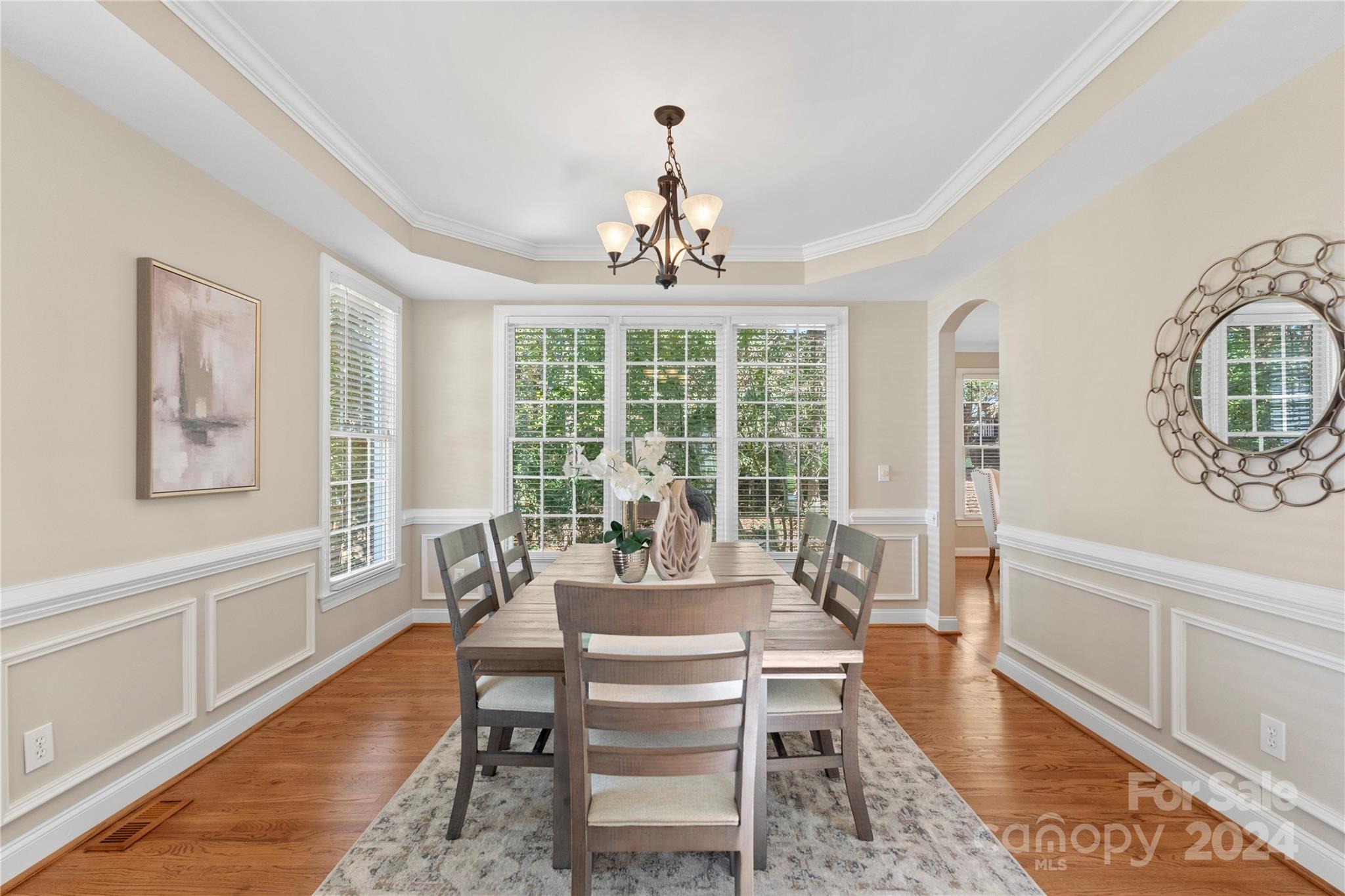 3417 Rhett Butler Place Charlotte, NC 28270 - Photo 13 of 48 a view of a dining room with furniture window and wooden floor