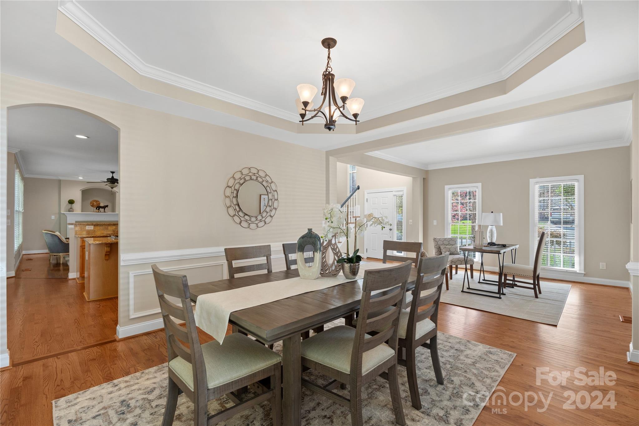 3417 Rhett Butler Place Charlotte, NC 28270 - Photo 14 of 48 a view of a dining room with furniture window and wooden floor