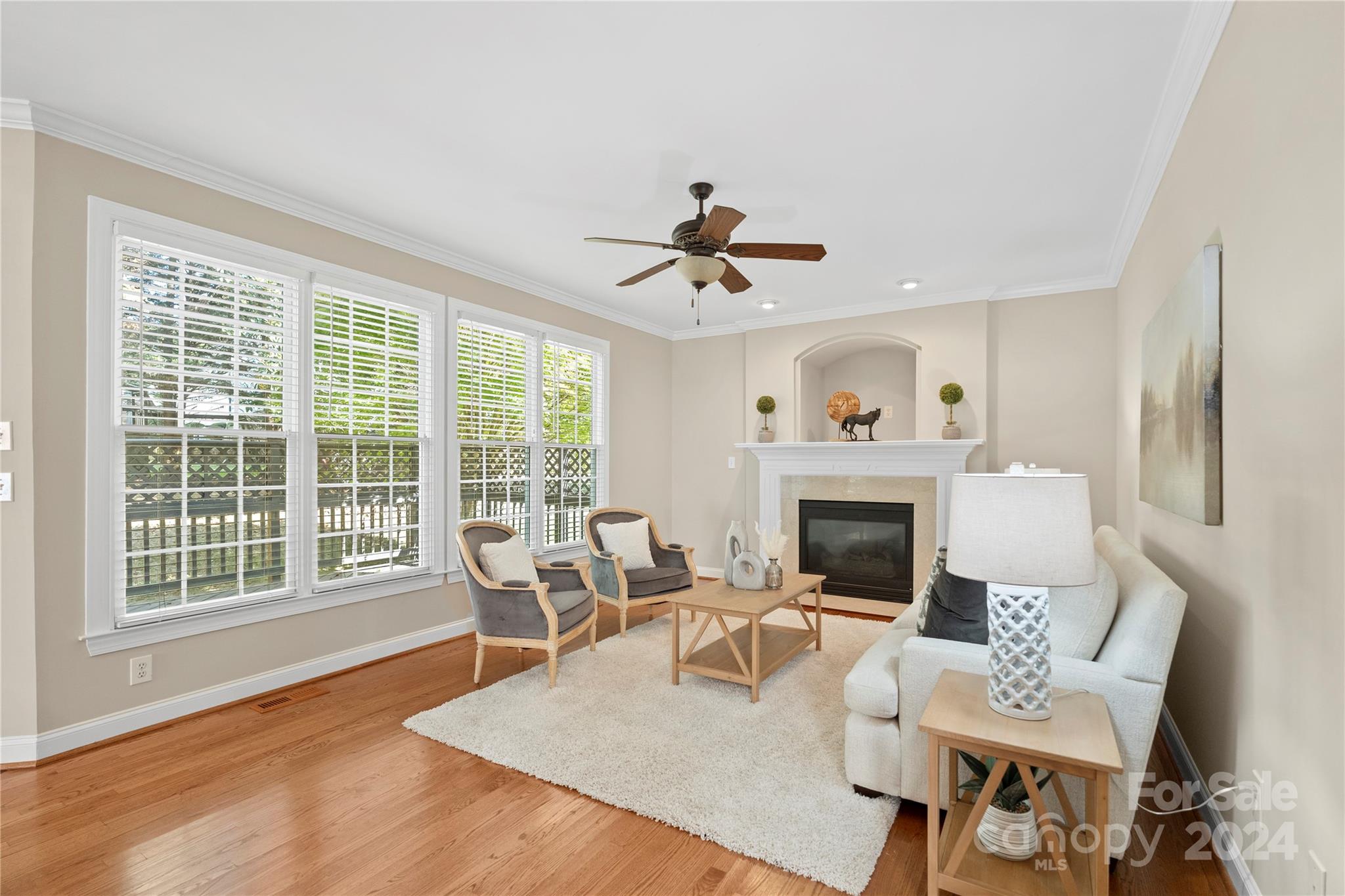 3417 Rhett Butler Place Charlotte, NC 28270 - Photo 15 of 48 a living room with furniture and a fireplace