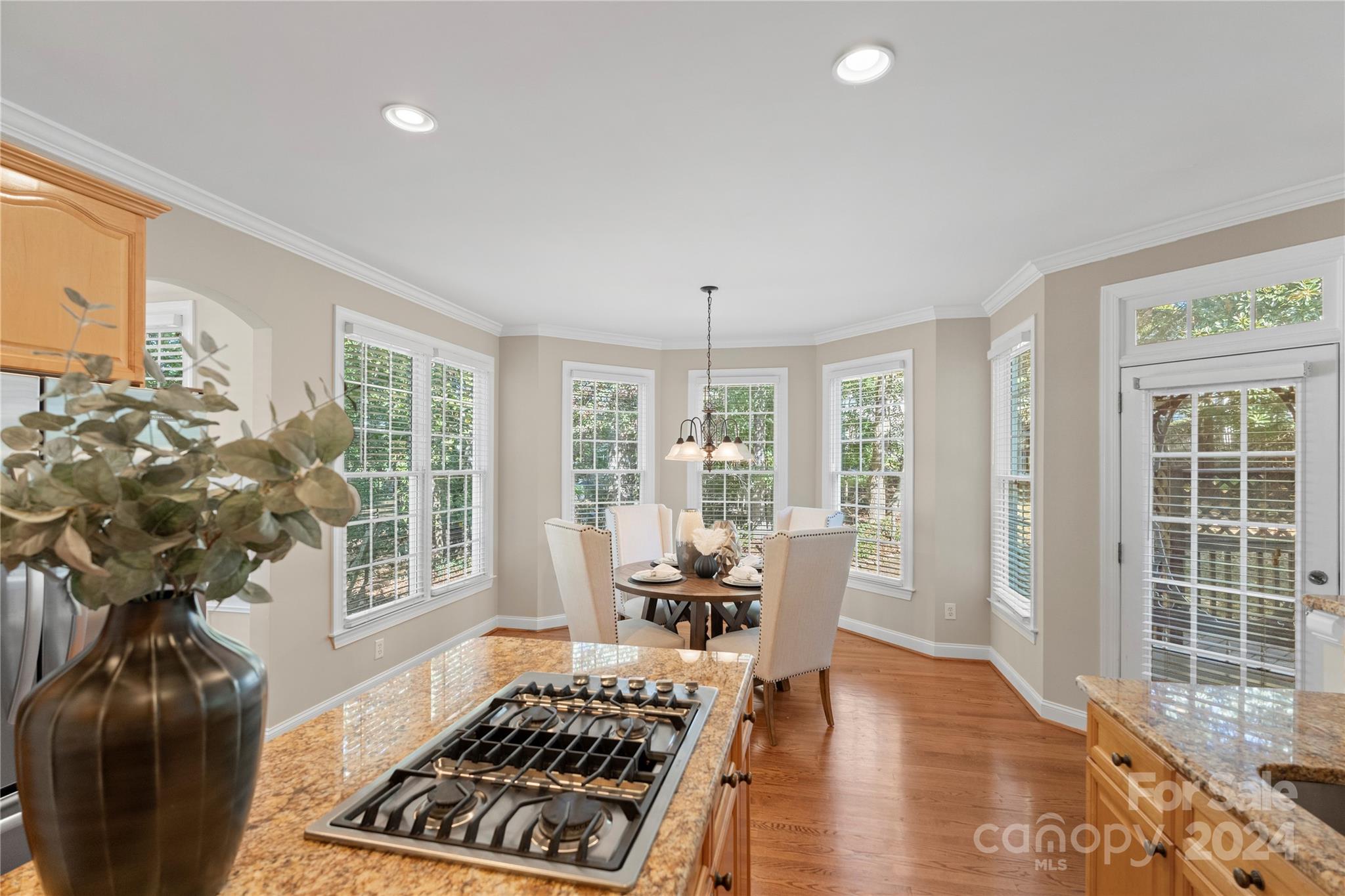 3417 Rhett Butler Place Charlotte, NC 28270 - Photo 22 of 48 a living room with furniture and a floor to ceiling window