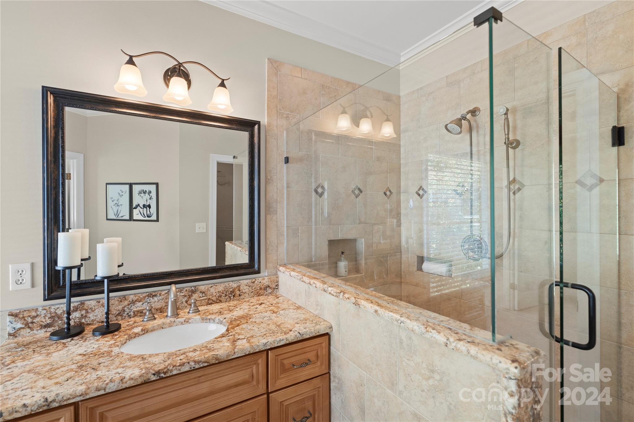 3417 Rhett Butler Place Charlotte, NC 28270 - Photo 32 of 48 a bathroom with a granite countertop sink mirror and shower