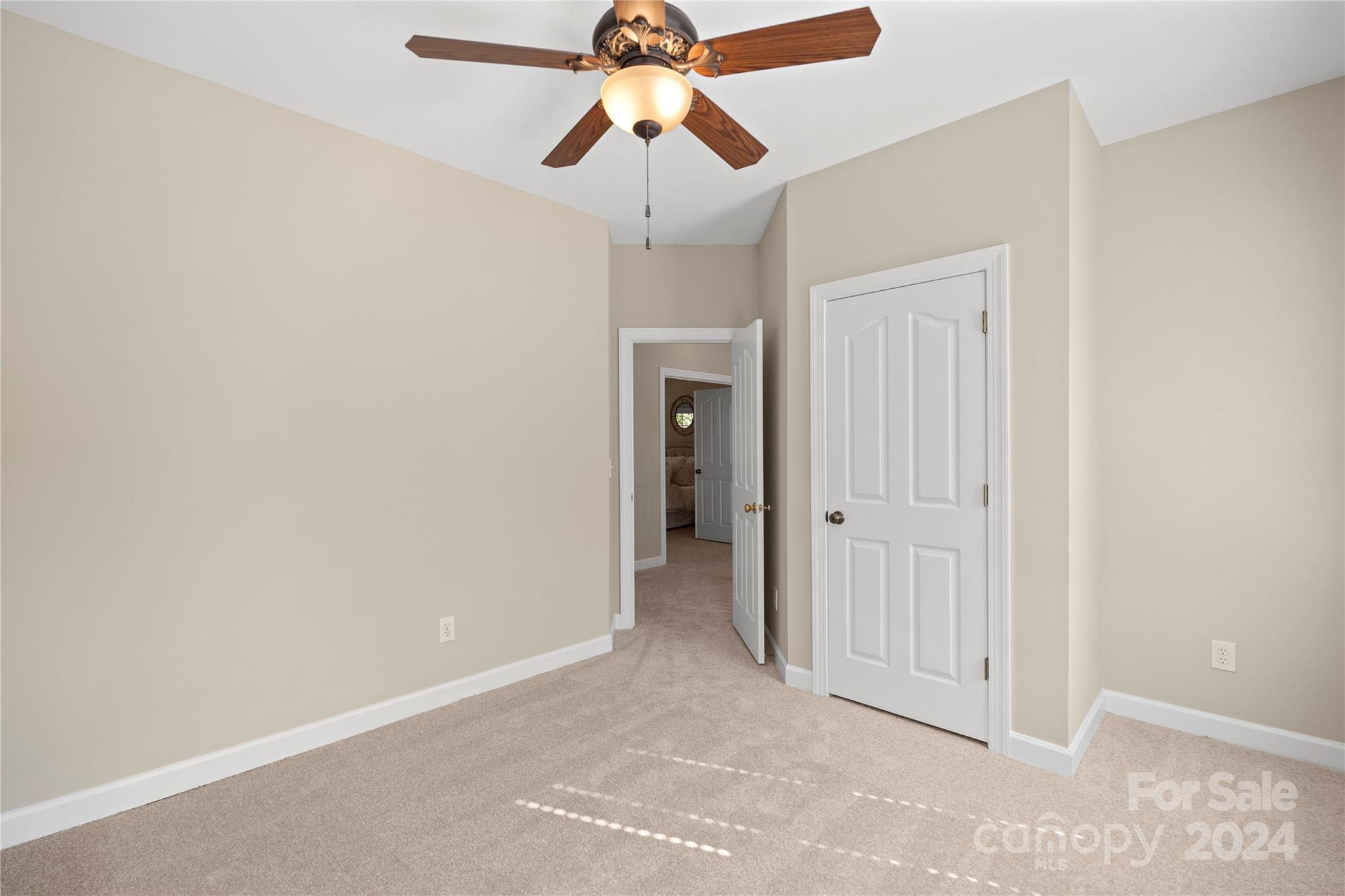 3417 Rhett Butler Place Charlotte, NC 28270 - Photo 35 of 48 a view of a chandelier fan in a room