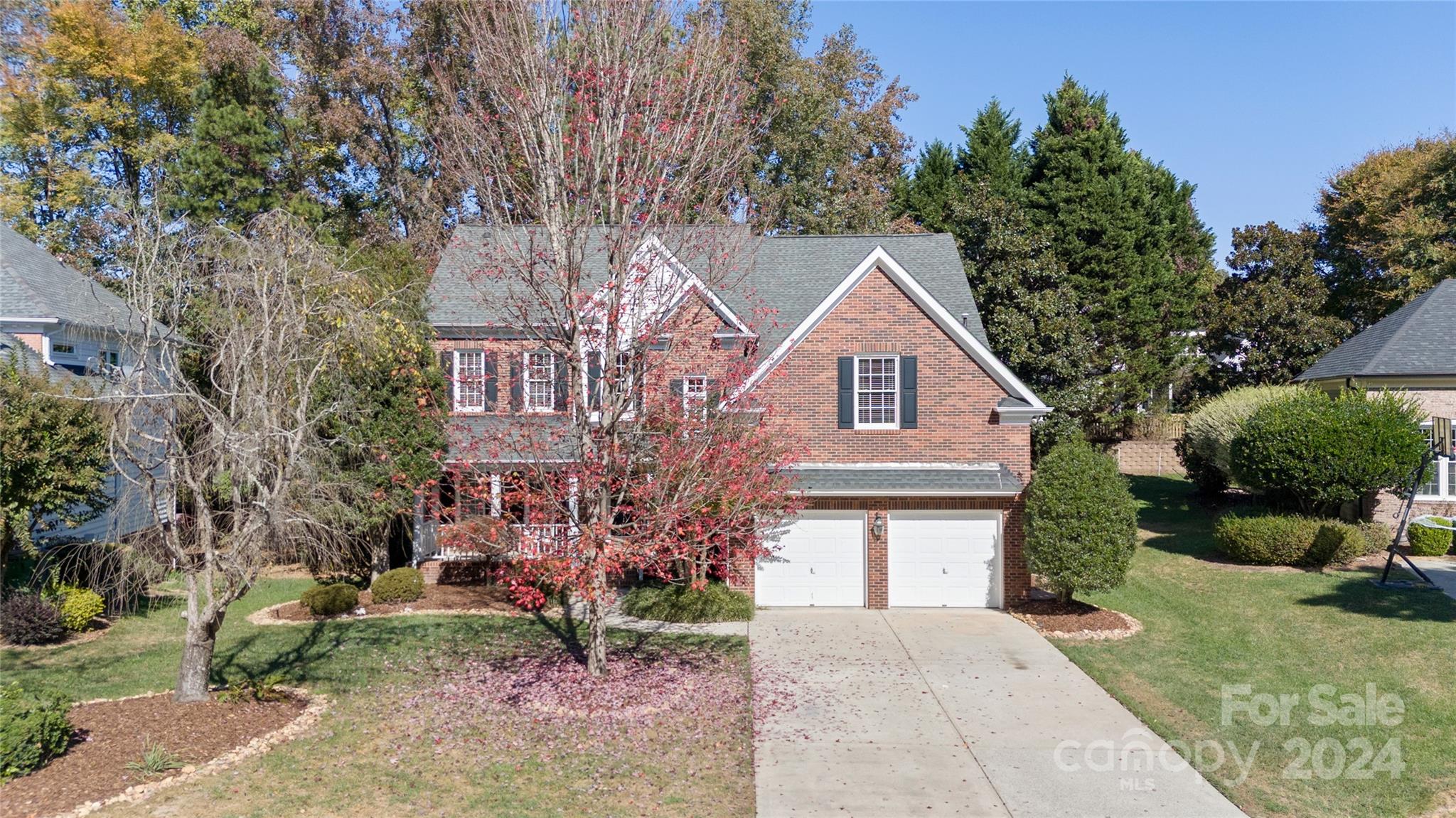 3417 Rhett Butler Place Charlotte, NC 28270 - Photo 45 of 48 a front view of a house with garden