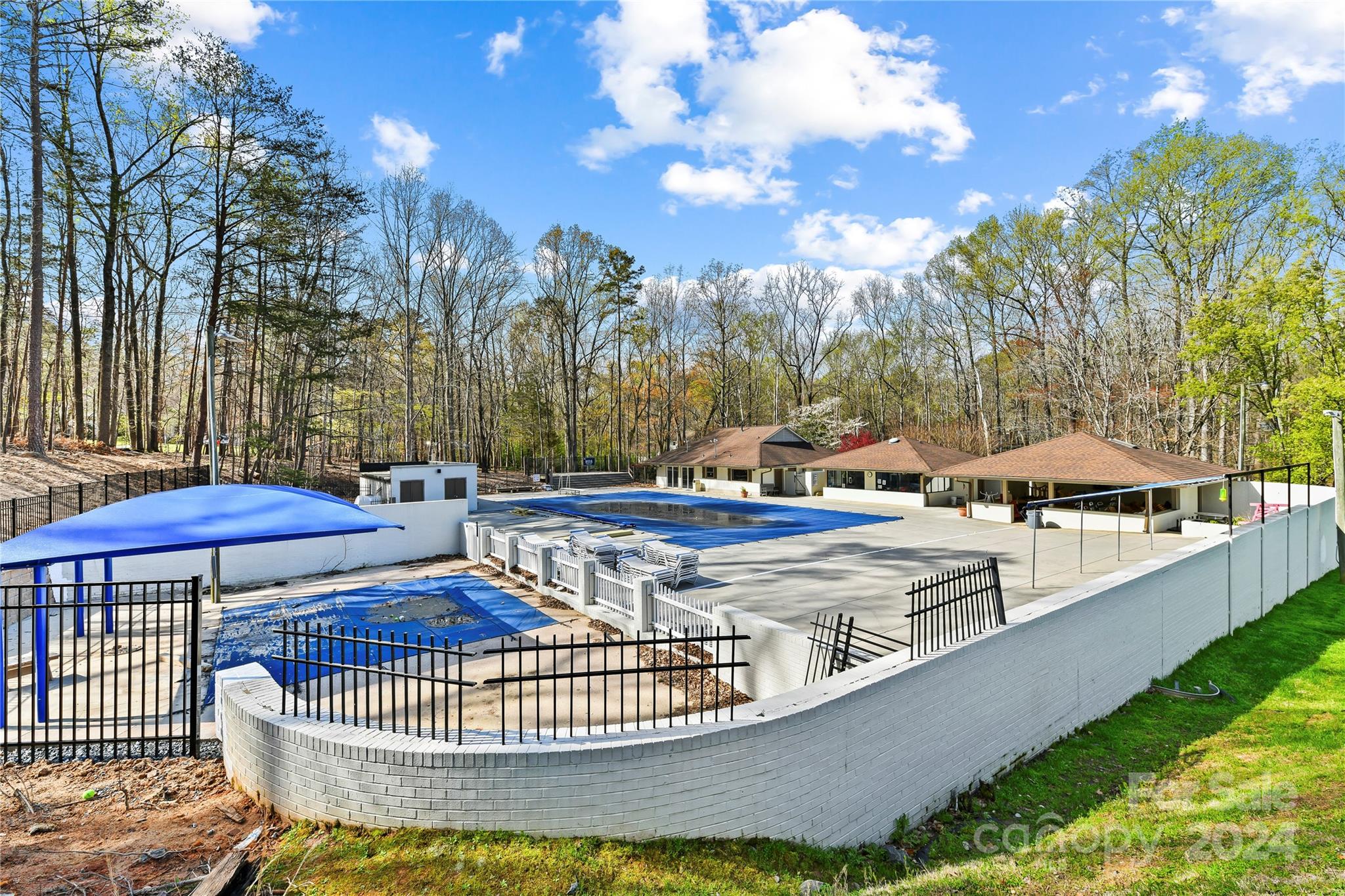 3417 Rhett Butler Place Charlotte, NC 28270 - Photo 47 of 48 a view of a swimming pool with sitting area and furniture