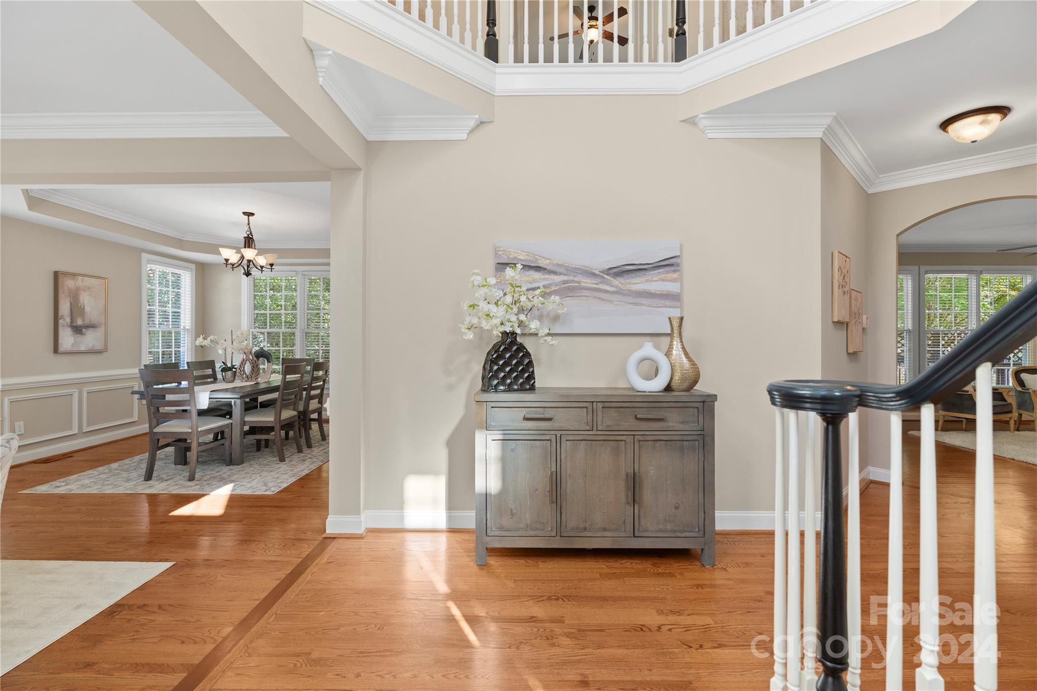 3417 Rhett Butler Place Charlotte, NC 28270 - Photo 6 of 48 a living room with furniture and a wooden floor
