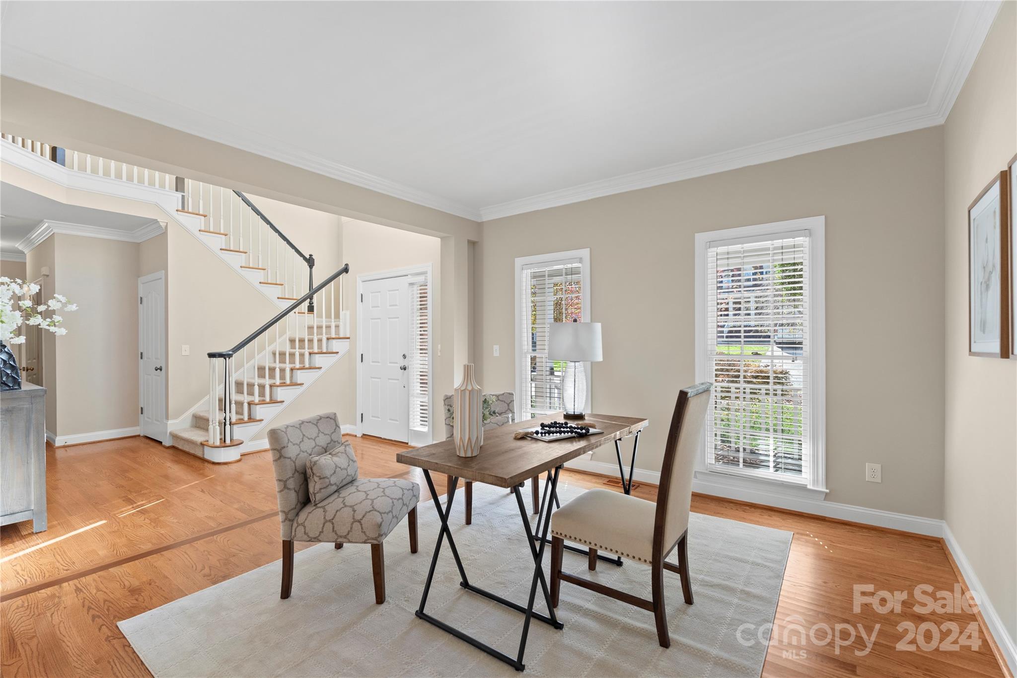 3417 Rhett Butler Place Charlotte, NC 28270 - Photo 10 of 48 a view of a livingroom with furniture and stairs