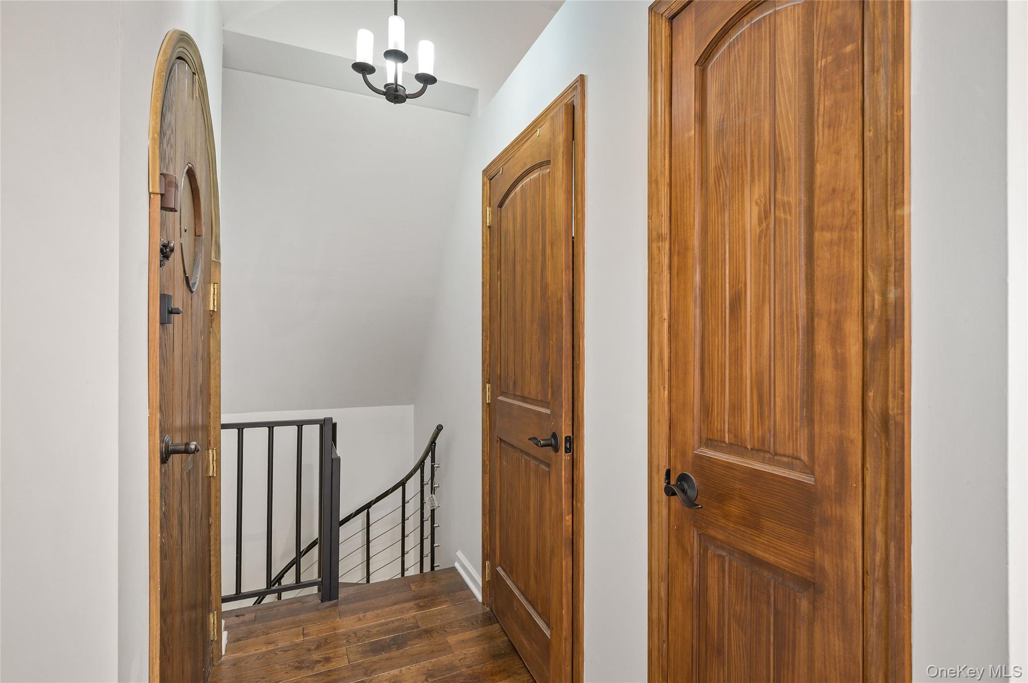 150 Kings Highway New Rochelle, NY 10801 - Photo 2 of 19 a view of a hallway with entryway and chandelier