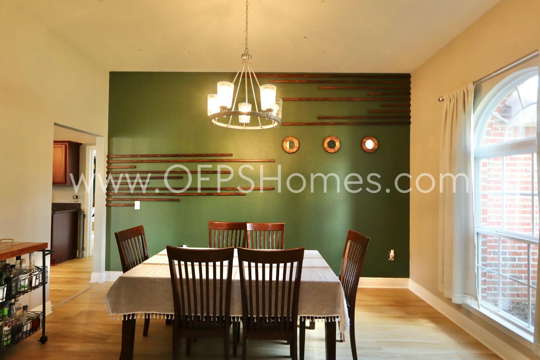 2400 Avenida De Sol Navarre, FL 32566 - Photo 3 of 42 a view of a dining room with furniture and chandelier