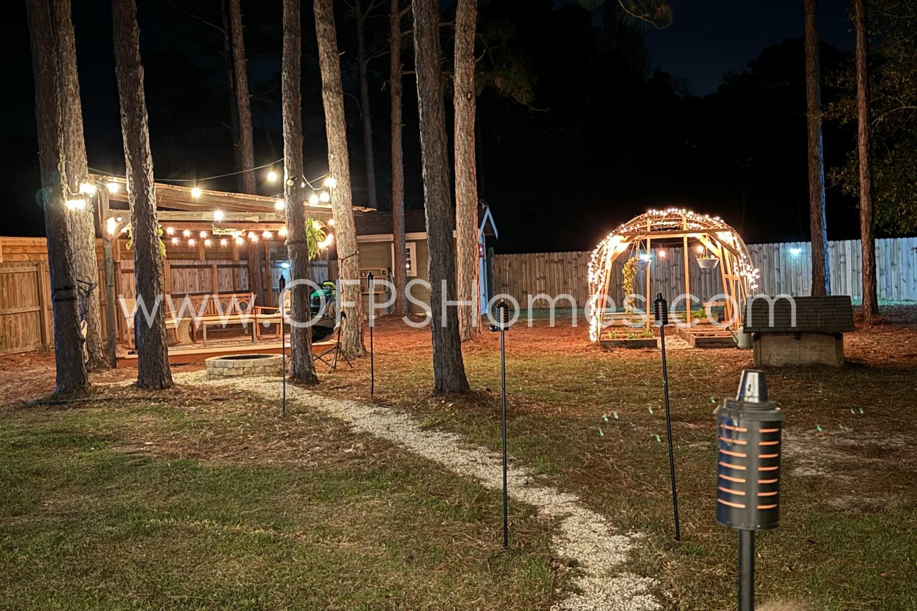 2400 Avenida De Sol Navarre, FL 32566 - Photo 40 of 42 a view of a yard