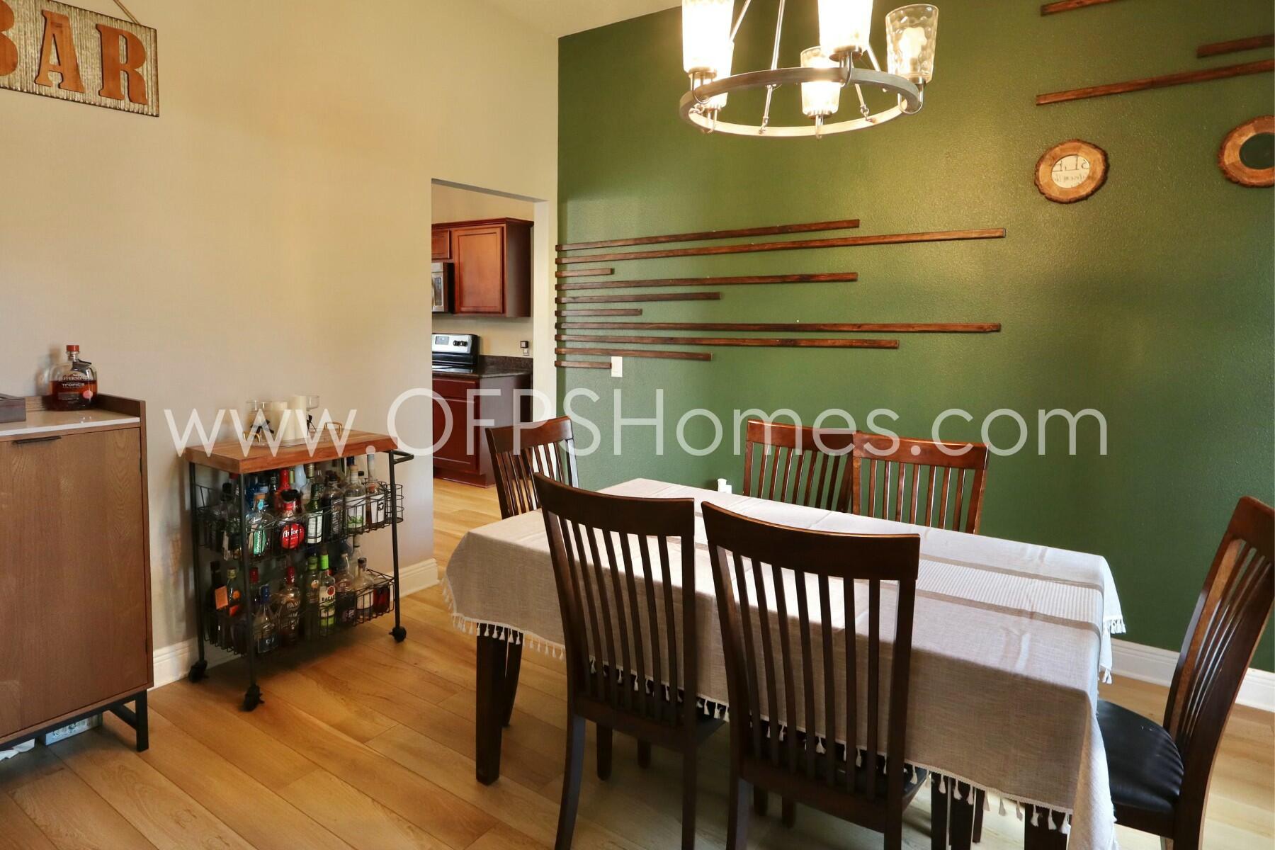 2400 Avenida De Sol Navarre, FL 32566 - Photo 4 of 42 a view of a dining room with furniture and wooden floor
