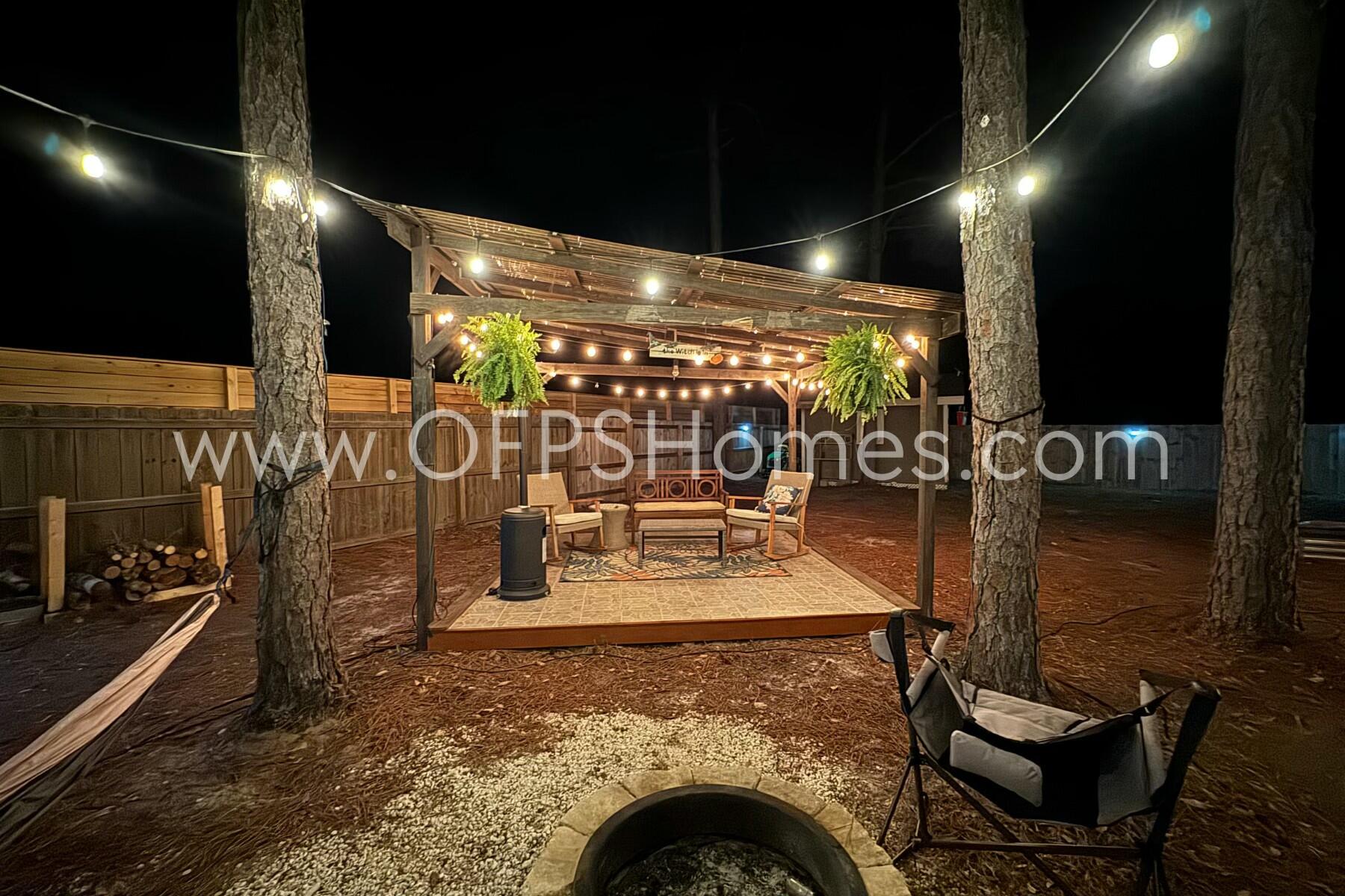 2400 Avenida De Sol Navarre, FL 32566 - Photo 42 of 42 a view of a livingroom with furniture and chandelier