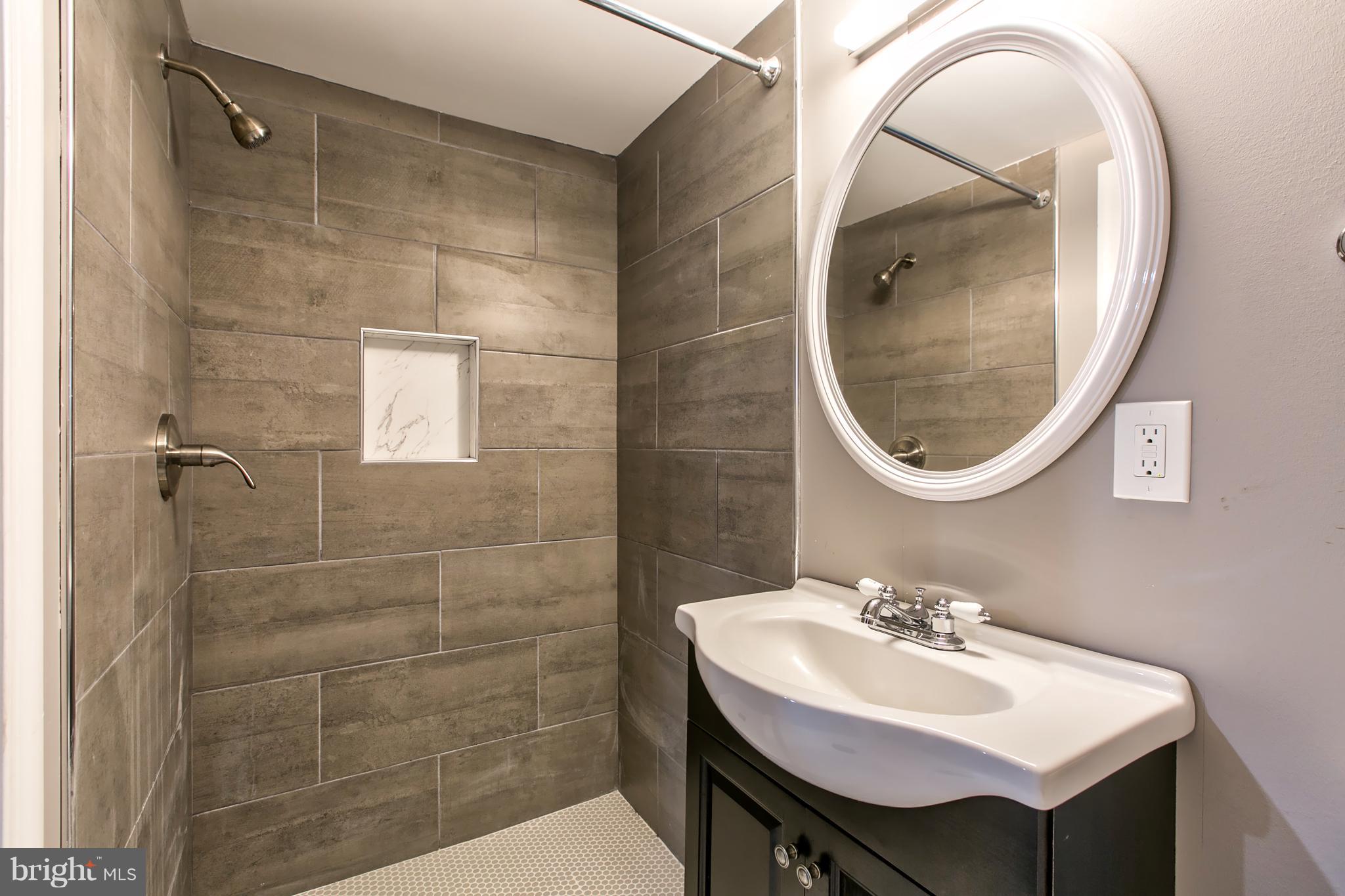 1670 Burnwood Road Baltimore, MD 21239 - Photo 21 of 30 Basement Bathroom