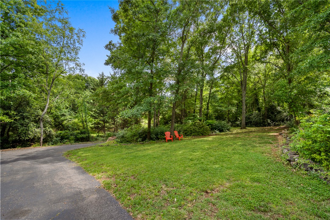 324 Hobson Road Anderson, SC 29621 - Photo 40 of 46 This serene property offers a picturesque, private yard with mature trees.