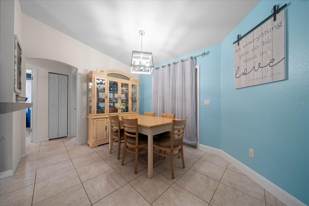 5321 Southwest 115th Loop Ocala, FL 34476 - Photo 19 of 49 a view of a dining room with furniture