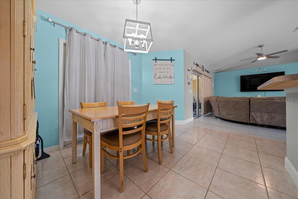 5321 Southwest 115th Loop Ocala, FL 34476 - Photo 20 of 49 a view of a livingroom with furniture and window