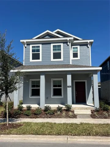 a front view of a house with yard